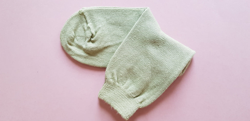 Vintage-style comfortable olive-green toddler socks with stretchy seams