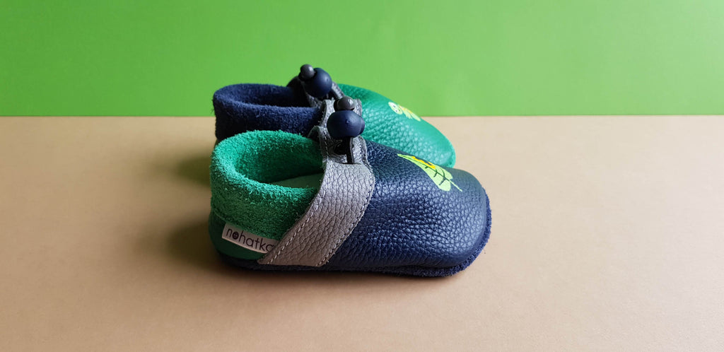Handpainted Caterpillar Nohatka soft sole booties/slippers for babies and toddler, anatomically shaped from soft leather with adjustable ankle fastening and anti slip indoor/outdoor sole