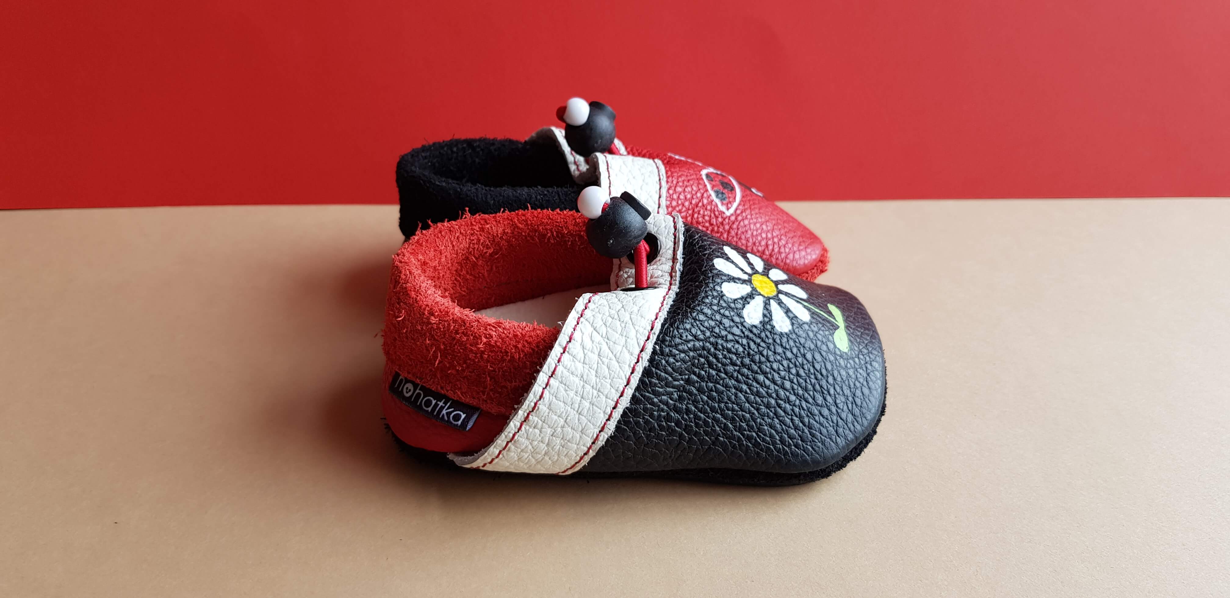 Handpainted Ladybird Nohatka soft sole booties/slippers for babies and toddler, anatomically shaped from soft leather with adjustable ankle fastening and anti slip indoor/outdoor sole