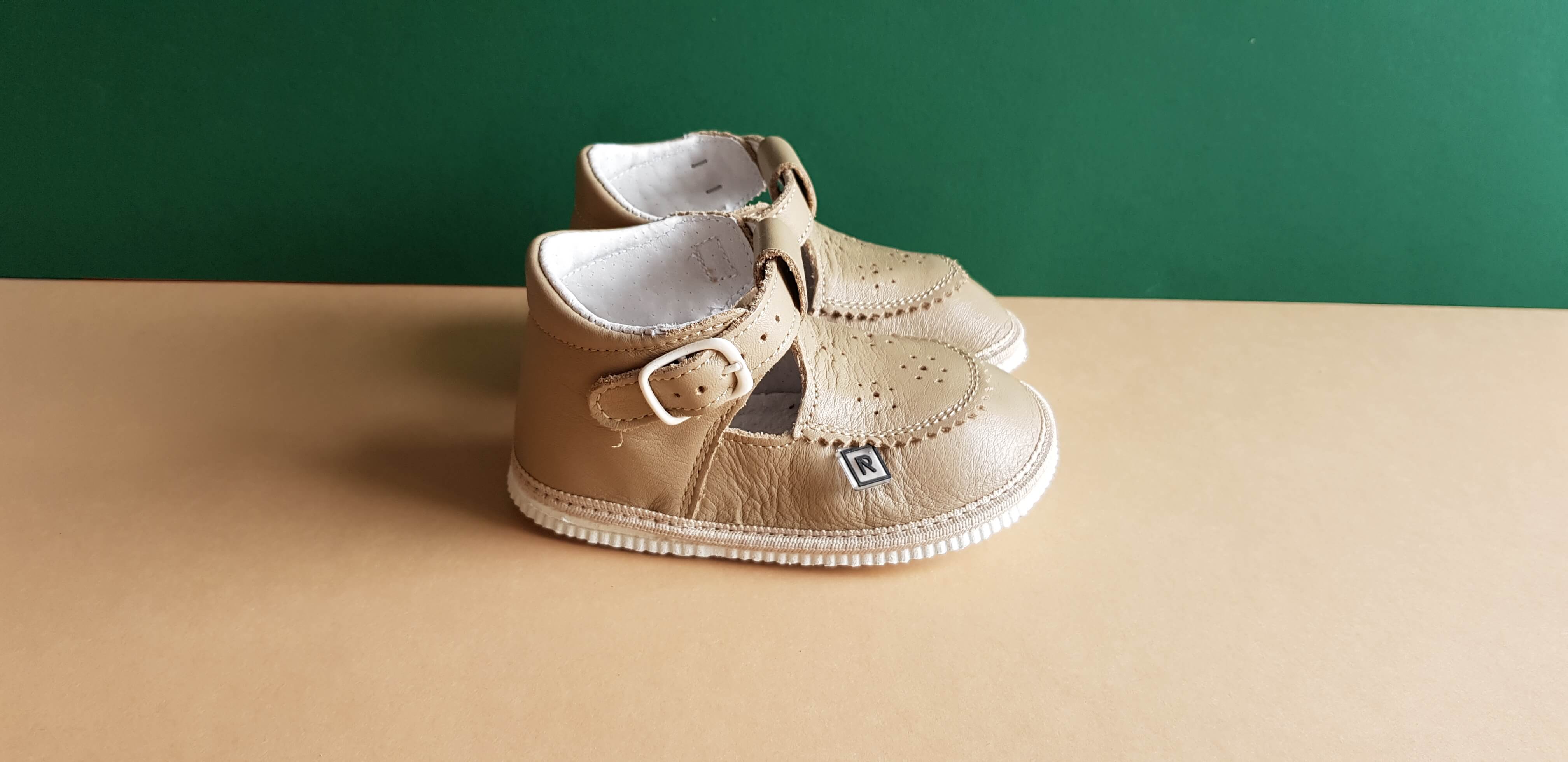 Cream first walking t-bar shoes for babies or toddlers with anatomically shaped toe box made from soft leather