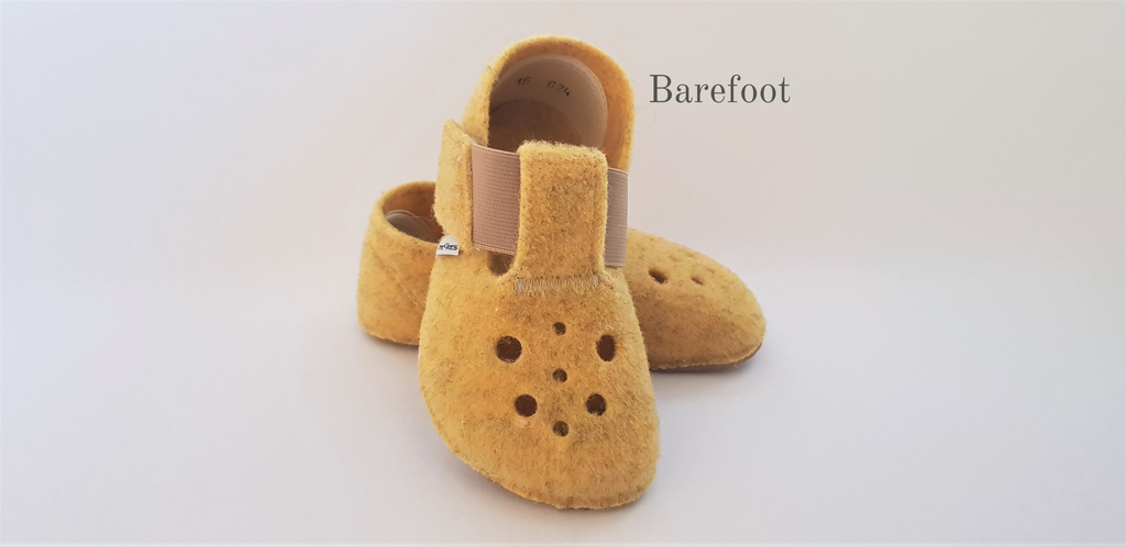 Yellow warm barefoot slippers made from recycled polyester for toddlers and children with anatomically shaped toe box